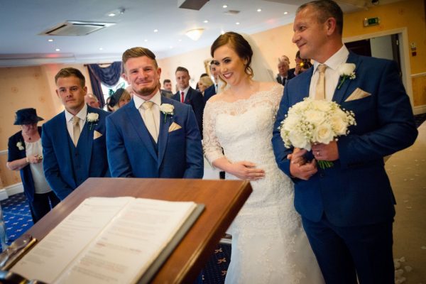 bride arrives down aisle with dad