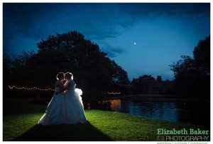 night photography brides kissing