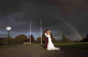 kissing under rainbow