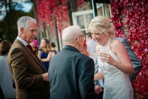 bride shares a moment with Grandad