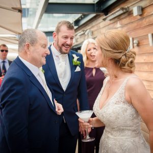 Dad of groom congratulates the bride