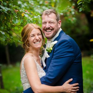 urban park trees couple laughing