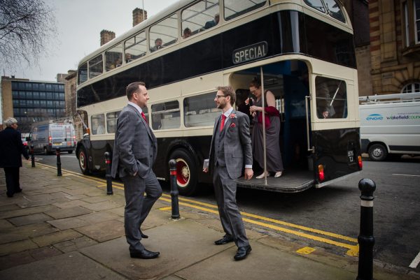 vintage bus arrives at town hall