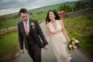 walking up the road laughing