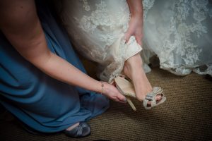 brides shoes going on