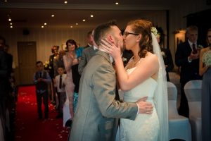 first kiss of newlyweds
