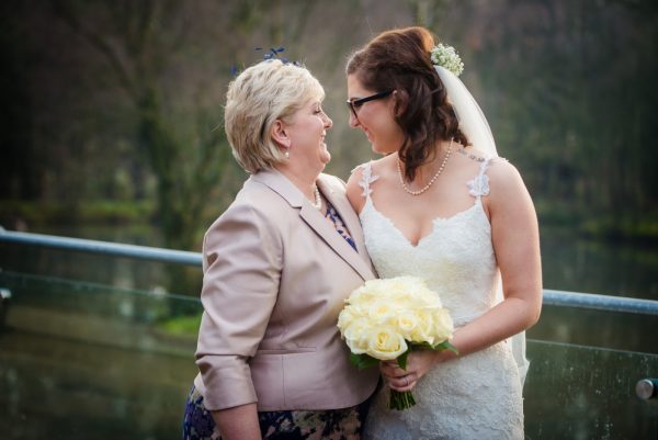 bride and mum share a moment