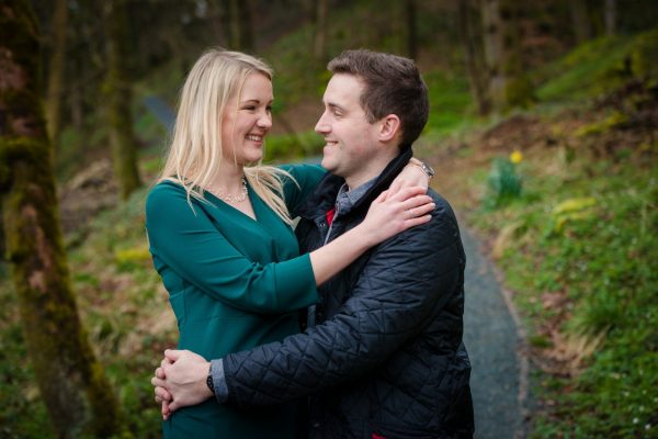 engaged couple romantic hugging