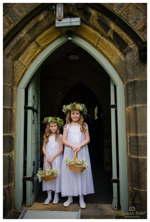 flowergirls in the church doorway
