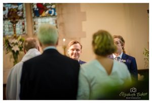 walking in church with dad groom waiting