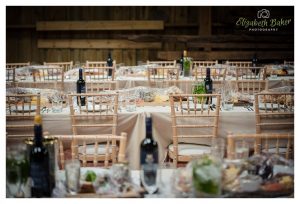 table settings wine and flowers on table