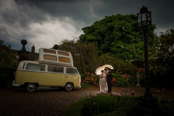 campervan in storm wedding couple