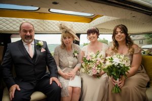 bride and family arrive in campervan