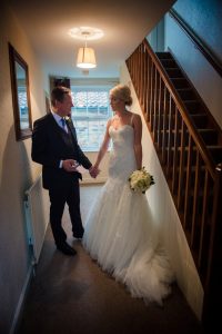 dad and bride have a moment before they leave
