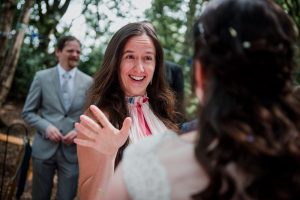 wedding guest talks to bride