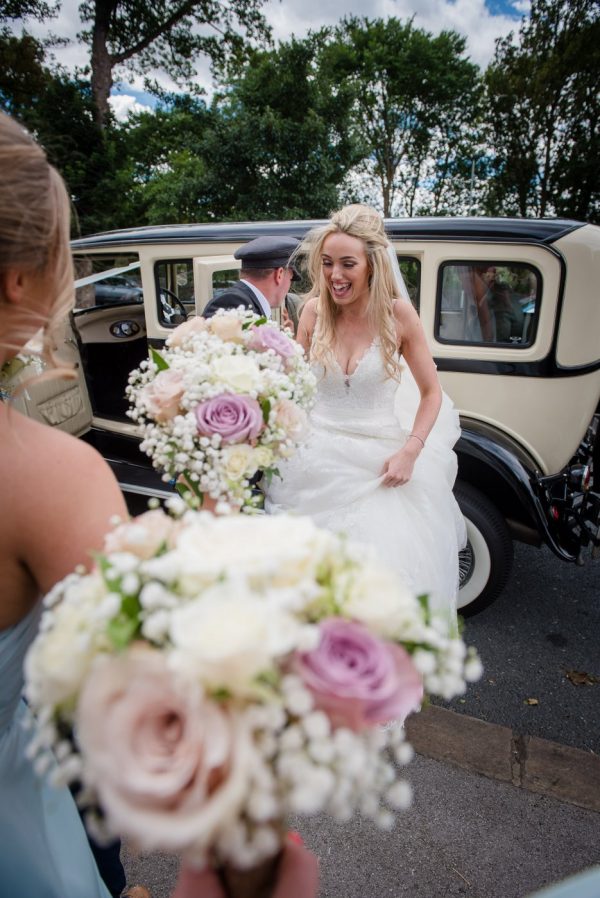 bride arrives by car