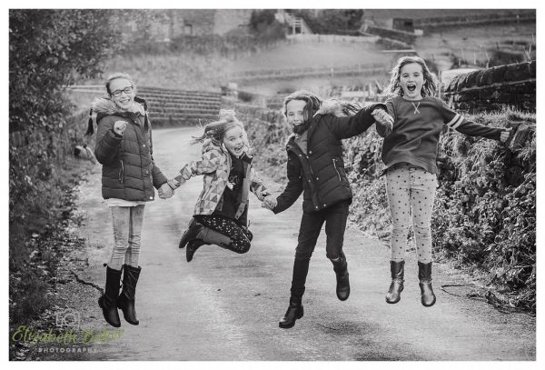 jumping cousins girls playing