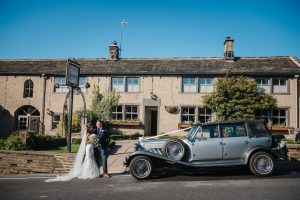 Bride groom exterior of Fleece countryside inn