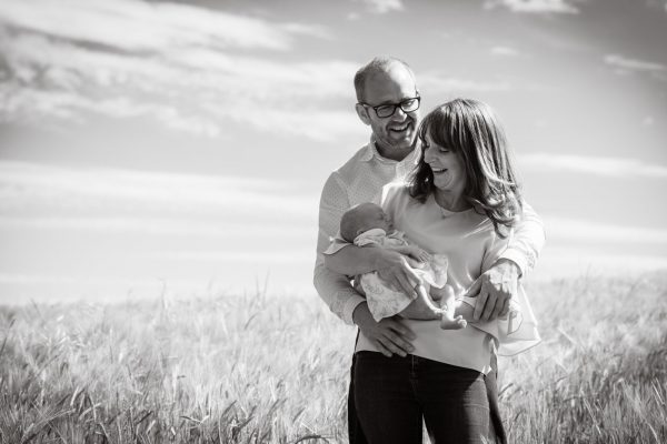 black and white portrait of newborn and parents