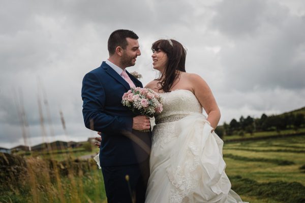 newly married couple in field Yorkshire