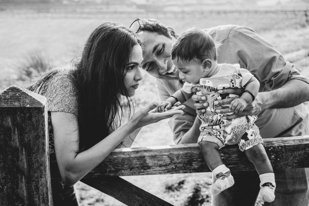 black and white image of family outdoors