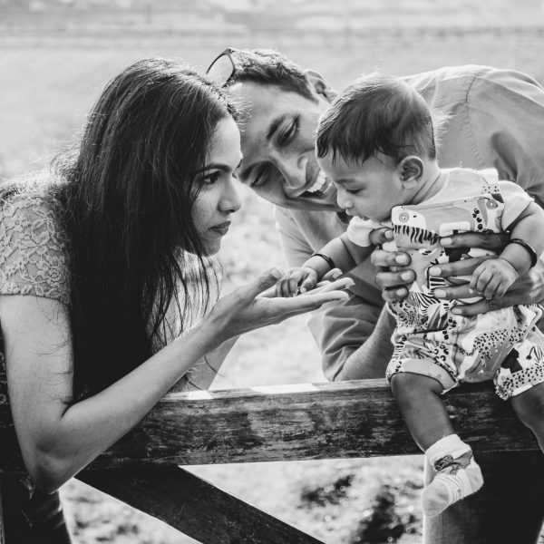black and white image of family outdoors