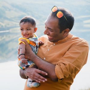 dad laughing with baby