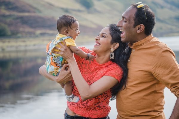 family photo by scenic lake in marsden