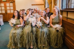 bridesmaids watching their friend Sheffield Town Hall for the wedding